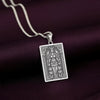 A handcrafted 925 sterling silver Freya charm in a rectangular tarot card shape. This personalized piece of Viking jewelry shows the goddess with her famous necklace, Brísingamen, and her cat companions, embodying the divine feminine.