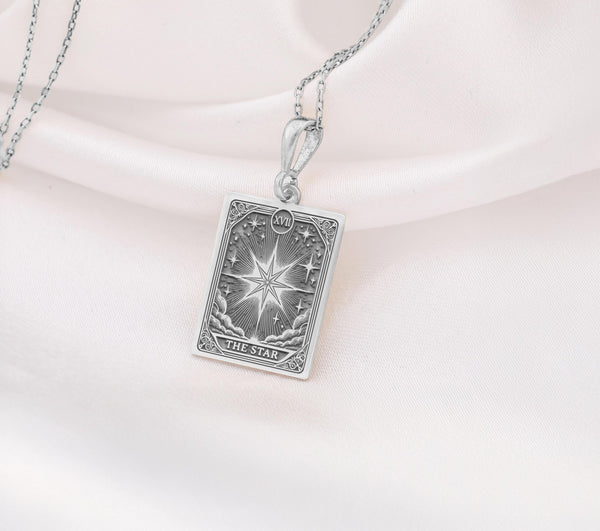 925 Sterling silver Star Tarot Card pendant necklace with detailed celestial engraving, featuring the iconic eight-pointed star symbolizing hope and renewal. Rectangular tarot-inspired design with intricate rays of light, moon phases, and mystical elements. Customizable spiritual jewelry perfect for divination enthusiasts and tarot collectors. Personalized metaphysical gift with "THE STAR" inscription. Handcrafted Major Arcana talisman representing divine guidance.
