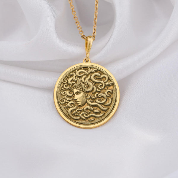 14K Gold Medusa Pendant Necklace – A powerful symbol of Greek mythology, featuring the iconic Medusa design with intricate details, representing strength and transformation. Perfect for lovers of mythical jewelry.