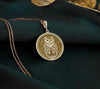 14K Gold Plated Owl Medallion Pendant featuring wisdom symbol on circular design. Affordable luxury jewelry with detailed owl carving, expressive eyes and textured background. Perfect spiritual gift with ancient meaning.