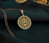 Elegant feminist pendant in 14K gold plated, featuring a raised fist and celestial symbols. This empowerment medallion represents resilience and activism, making it an ideal gold-plated women’s rights necklace.