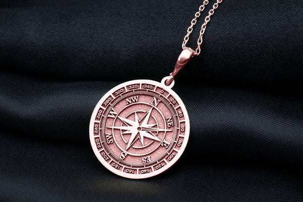 Rose gold plated compass charm necklace, lightweight and dainty. Perfect for layering and everyday wear, this unique pendant brings warmth and style to any outfit. Ideal as a personalized gift for those who love to explore