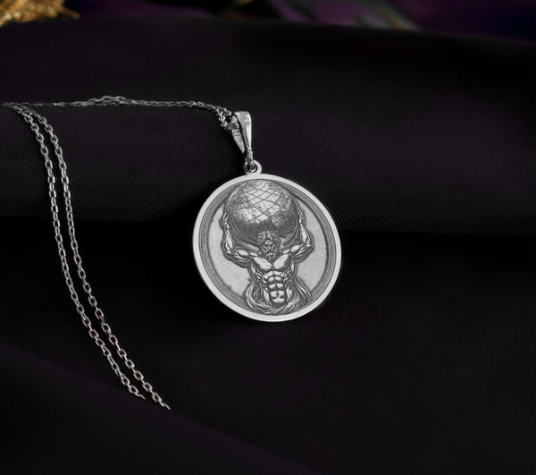 Titan Atlas silver necklace, a meticulously crafted pendant drawn from ancient Greek mythology and Titan legends. This modern statement piece features a sleek silver finish that captures the enduring power of the Titan Atlas while adding a cool, contemporary edge. Perfect for individuals seeking refined, myth-inspired jewelry with bold, timeless appeal.