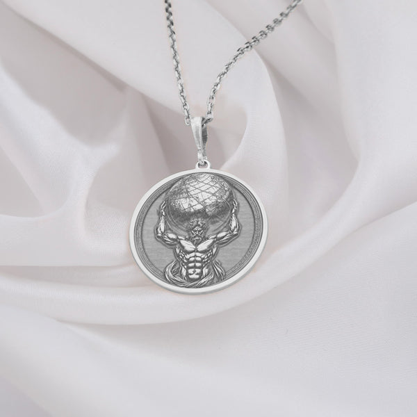 Titan Atlas silver necklace, a meticulously crafted pendant drawn from ancient Greek mythology and Titan legends. This modern statement piece features a sleek silver finish that captures the enduring power of the Titan Atlas while adding a cool, contemporary edge. Perfect for individuals seeking refined, myth-inspired jewelry with bold, timeless appeal.