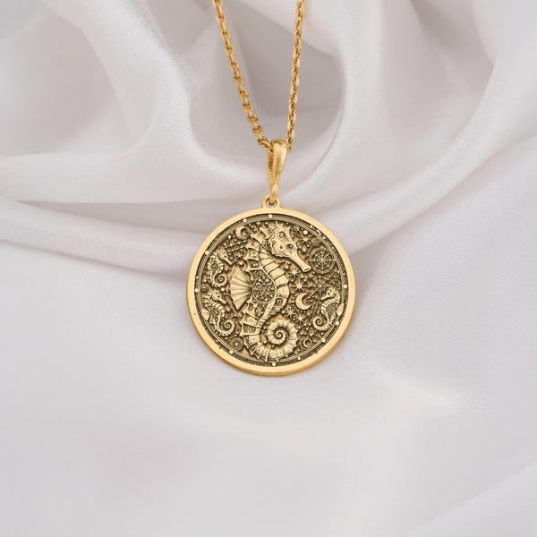 14k gold seahorse necklace featuring a detailed nautical design, perfect for ocean lovers and beach themed occasions, made with high quality solid gold.