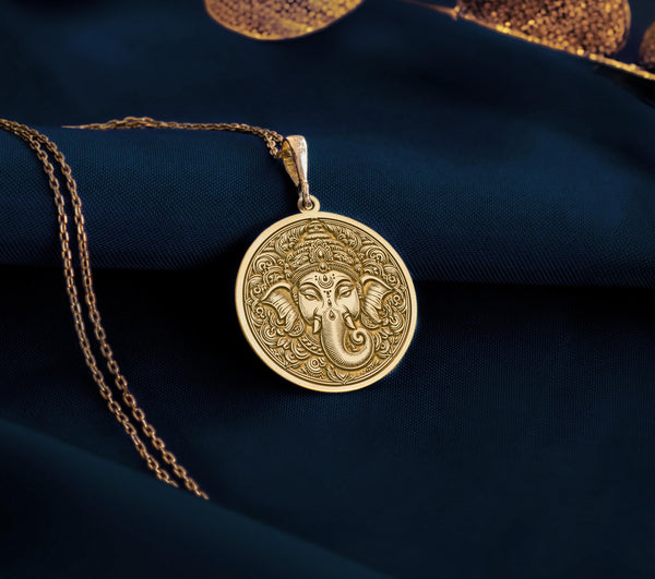 Ganesha gold amulet featuring Ganesha, symbolizing wisdom, strength, and prosperity. This intricately crafted pendant is ideal for everyday wear or as a meaningful gift, representing protection and resilience. real gold ganapatya