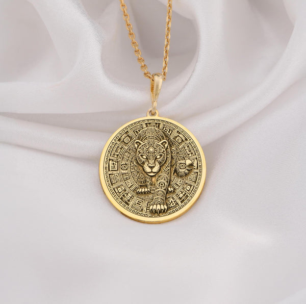 14K Gold jaguar pendant necklace with intricate Aztec inspired patterns, symbolizing strength and power. Perfect for animal lovers as a luxury gift for special occasions like birthdays, anniversaries, or celebrations.