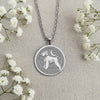 Sterling Silver Schnauzer coin necklace charm showing a finely detailed portrait of the beloved dog breed. Handcrafted pet memorial jewelry with an artistic, classic design. An ideal keepsake gift for any dog lover or Schnauzer mom