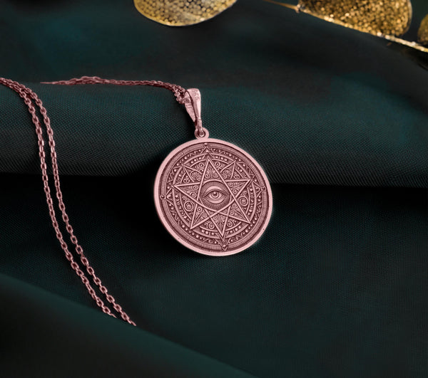 Rose gold plated eye necklace with a star design, combining celestial symbolism and elegant geometric patterns. The protective all seeing eye makes this pendant a stylish and meaningful gift for men and women.