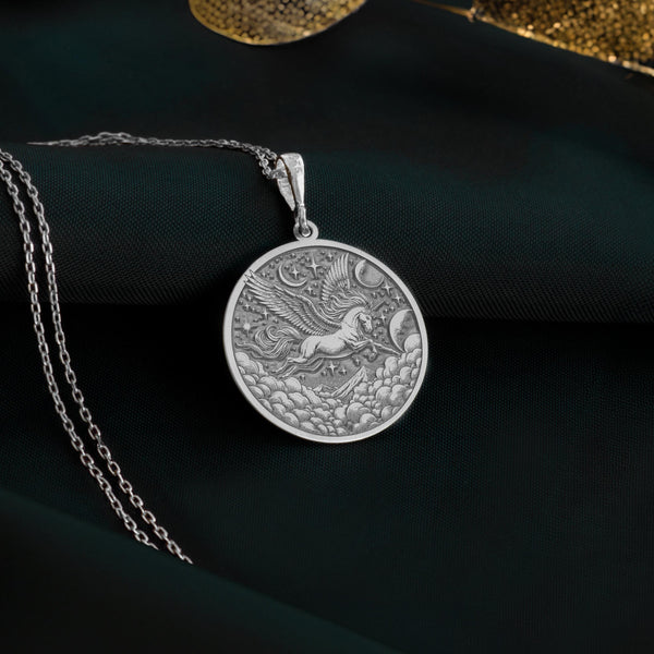 Silver Pegasus Charm Necklace, flying horse, Pegasus, also known as a horned flying horse. This silver necklace symbolizes freedom. Choose between a silver pendant or silver medallion, each custom-made to order for lovers of fantasy jewelry."