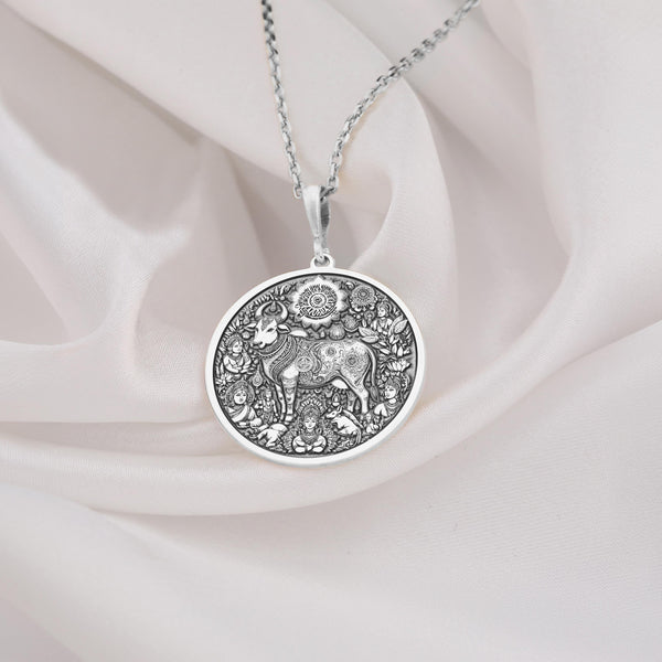Kamadhenu surabhi silver necklace, Hindu wish-fulfilling cow pendant, Divine Kamadhenu jewelry, bovine-goddess cow mother pendant, Prosperity cow silver pendant, Sacred Kamadhenu amulet, Kamadhenu charm necklace, Mythical cow silver jewelry.