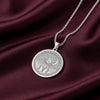 A striking 925 sterling silver celestial necklace showing a Portuguese Water Dog under the moon and stars. This unique piece of art is a beautiful symbol of a pet who has crossed the rainbow bridge.