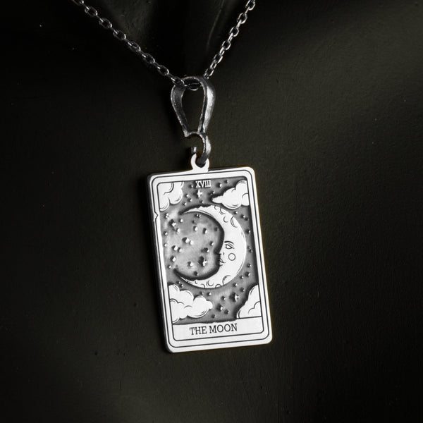 Solid silver Moon tarot card necklace with an etched charm, ideal as a custom charm necklace for layering. This unique piece brings hope and mystique to a personalized necklace collection, perfect for everyday wear as a protection amulet.