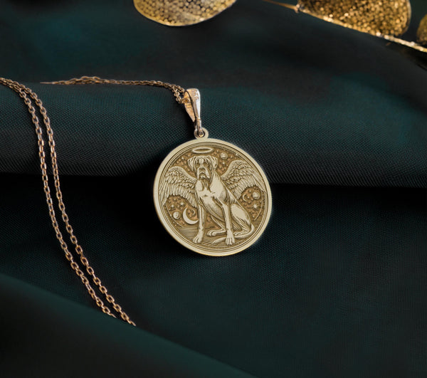 14K Gold Plated Boxer Angel Dog Medallion with memorial symbolism. Detailed working dog breed angel pendant with wings, halo and radiant elements. Elegant rainbow bridge jewelry gift representing eternal bond with departed guardian companion.
