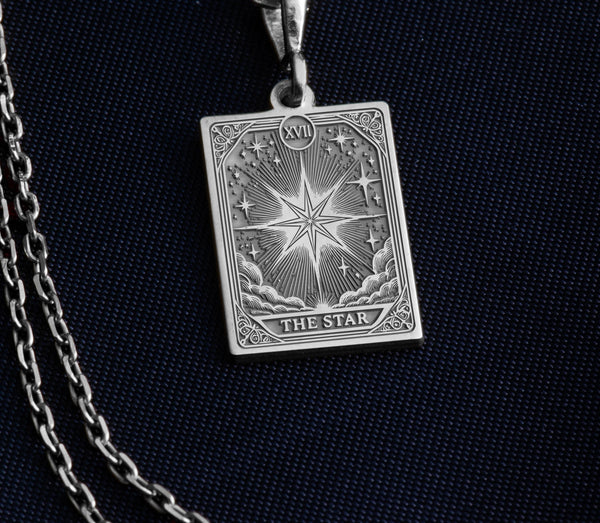 925 Sterling silver Star Tarot Card pendant necklace with detailed celestial engraving, featuring the iconic eight-pointed star symbolizing hope and renewal. Rectangular tarot-inspired design with intricate rays of light, moon phases, and mystical elements. Customizable spiritual jewelry perfect for divination enthusiasts and tarot collectors. Personalized metaphysical gift with "THE STAR" inscription. Handcrafted Major Arcana talisman representing divine guidance.