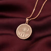 A unique rose gold plated round necklace with a custom engraved portrait of a Portuguese Water Dog (PWD). The detailed artwork is a perfect sympathy gift for a loss of pet.
