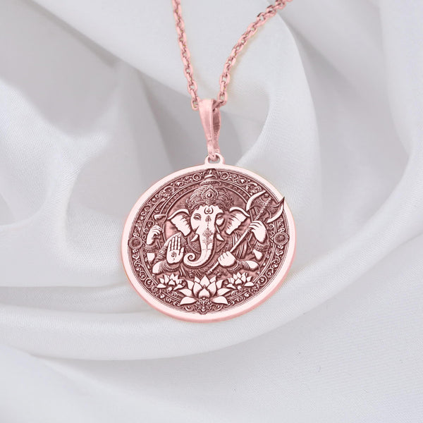 Rose gold Ganesha pendant, a unique spiritual charm symbolizing wisdom, fortune, and new beginnings. Handcrafted with intricate detail, this necklace is perfect for layering or as a thoughtful, elegant gift.