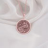 Stylish Rose Gold Plated peacock medallion necklace with rich engraved textures. A feminine bird pendant for her.