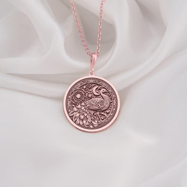 Stylish Rose Gold Plated peacock medallion necklace with rich engraved textures. A feminine bird pendant for her.