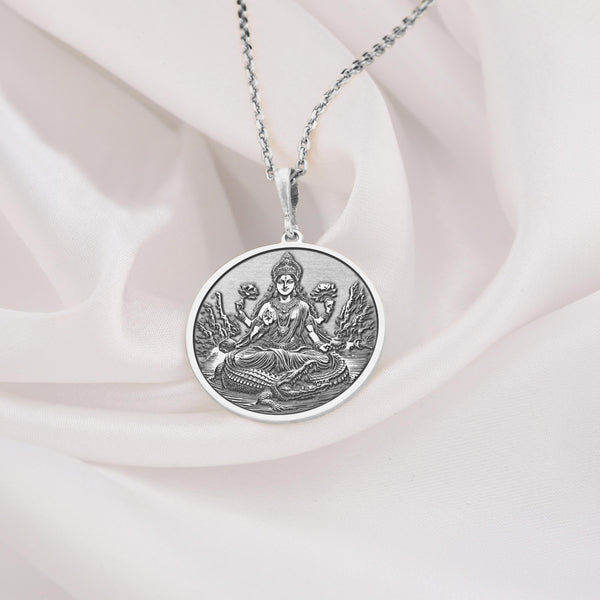 silver Ganga pendant featuring intricate details, symbolizing purity and grace, perfect for devotees and spiritual jewelry lovers.