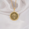 14K gold feminist pendant, featuring an intricately engraved raised fist, crescent moons, and floral elements. This women’s rights medallion symbolizes strength, unity, and progress, making it the perfect gold equality charm.