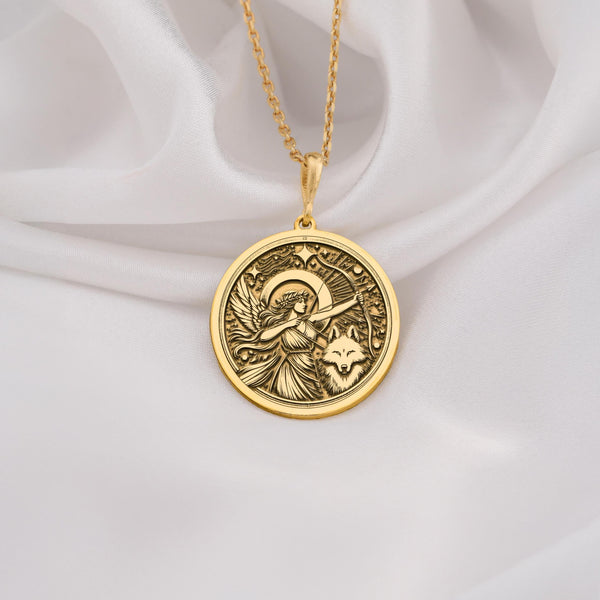 Artemis goddess pendant in 14K solid gold, engraved with a detailed moon and wolf design. This Greek mythology necklace symbolizes feminine strength, protection, and wisdom, making it a perfect celestial talisman for astrology and mythology lovers.