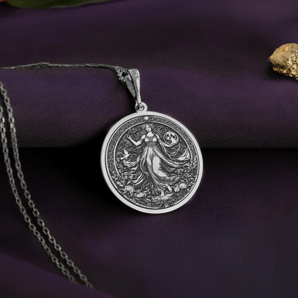 Gaia round pendant necklace with detailed earth-inspired engravings. This celestial silver medallion embodies nature’s balance and harmony, making it the perfect spiritual pendant for those who admire mythology, sacred symbols, and divine energy. A timeless, handcrafted piece that connects the wearer to Gaia’s enduring wisdom and power.