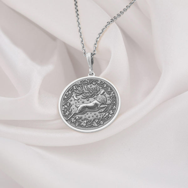 dainty silver Deer Pendant necklace - Elegant design inspired by nature, symbolizing forest vitality. Perfect gift for Christmas or special occasions, representing love, grace, and resilience. Deer jewelry elegant