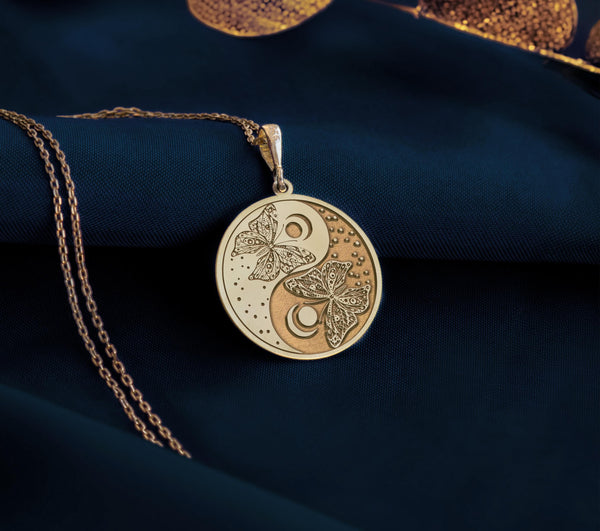 14K Gold Plated Butterfly Yin Yang Medallion with celestial elements. Spiritual balance pendant with detailed winged creatures and moon symbols. Elegant transformation jewelry gift representing harmony, duality and personal metamorphosis.