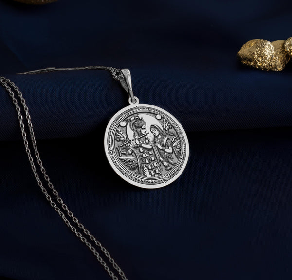 Krishna Radha pendant embodies romance and spirituality. Krishna serenading Radha with his flute makes this medallion a unique, meaningful jewelry piece, perfect for those who seek beauty and devotion in their accessories.