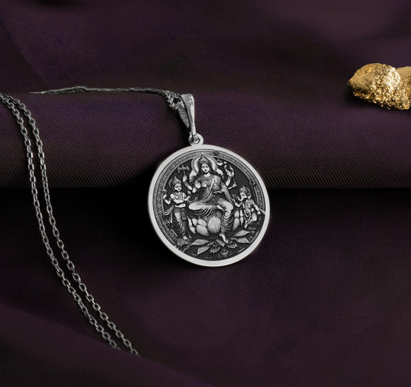 925 Sterling Silver Parvati and Sons Locket, featuring Parvati with Kartikeya and Ganesha, embodying divine motherhood, strength, and wisdom. This Hindu goddess locket is a sacred amulet for spiritual seekers, protection, and devotion to Shiva’s family.