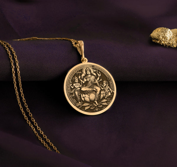 14K Gold Plated Parvati charm necklace Kartikeya & Ganesha Locket, designed as a spiritual Hindu pendant representing Parvati’s nurturing love and protection. This divine locket necklace is a powerful amulet for wisdom, prosperity, and strength in life’s journey.
