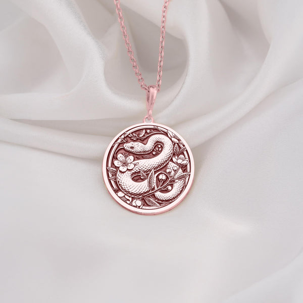 Rose gold plated snake necklace featuring a chic serpent charm. Handmade and versatile, this dainty jewelry piece is a great gift for her, offering a trendy and feminine touch to any outfit.