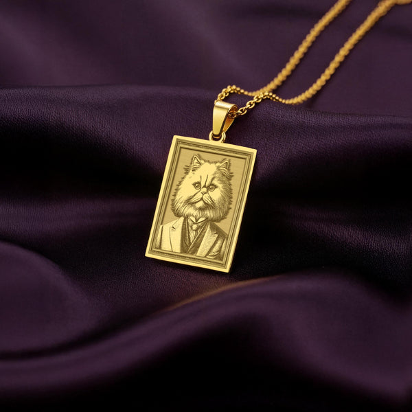 A slightly angled view of the 14K Solid Gold Persian Cat pendant, highlighting the intricate engraving on the cat's long fur and formal suit.