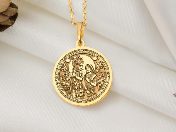 Krishna Radha necklace gold pendant symbolizes eternal love and spirituality. Krishna playing the flute for Radha captures romance and devotion. This elegant medallion is a timeless addition to any fine jewelry collection