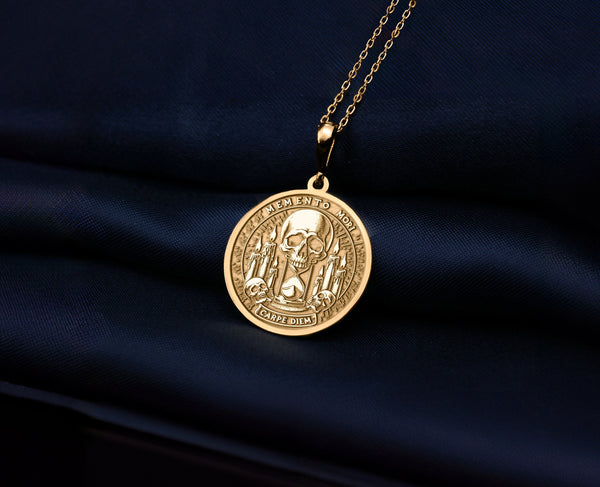 Memento Mori & Carpe Diem necklace, exquisitely crafted in radiant 14K Gold Plated, This detailed medallion features a central skull atop an hourglass, flanked by candles – a powerful reminder to live fully. A timeless piece of philosophical jewelry, perfect as a meaningful gift or personal talisman. Personalize it to make it uniquely yours. Carry this intricate symbol of stoic wisdom and seize the day.