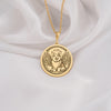 14K Solid Gold Pembroke Welsh Corgi Angel Dog Medallion featuring beloved royal breed with heavenly wings and halo. Detailed memorial talisman with short legs, fox-like face and ornate botanical border. Luxury Corgi memorial jewelry gift