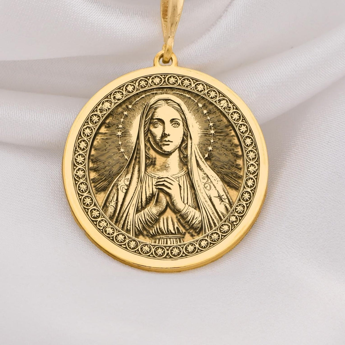 14K Solid Gold Queen of Peace necklace featuring Virgin Mary with halo and praying hands. A sacred and elegant Catholic gold medallion.