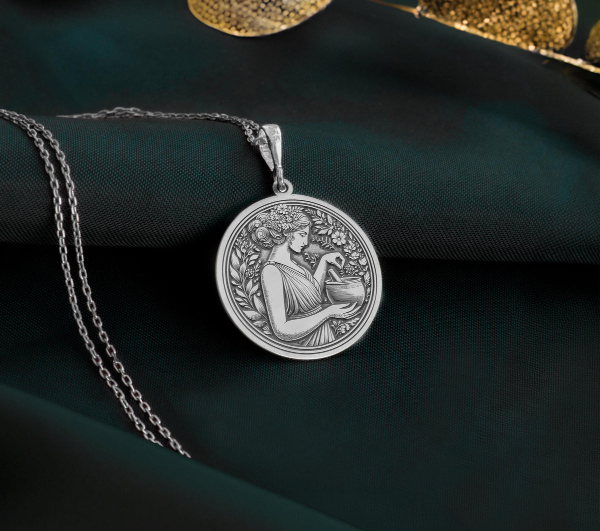 925 Sterling Silver Panacea Pendant with medallion design. Handcrafted silver coin charm with detailed Greek healing goddess profile and botanical border. Medicine symbol necklace featuring health deity, perfect medical professional gift.