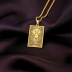 An heirloom-quality 14K solid gold Sphynx Cat tarot pendant. The art shows the regal cat, symbolizing its divine nature, a precious cat mom gift.