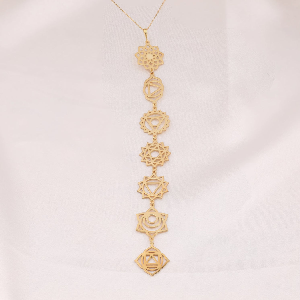 14K Gold 7 Chakras Cascade Y-Lariat Drop Necklace Studio Hero Shot on Ivory Silk