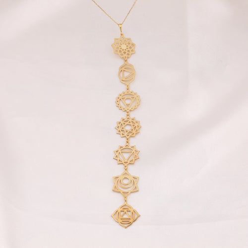 14K Gold 7 Chakras Cascade Y-Lariat Drop Necklace Studio Hero Shot on Ivory Silk