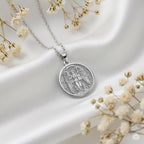 A striking 925 sterling silver celestial necklace showing the Virgo constellation symbol. The unique artwork features a graceful goddess, The Maiden, holding a sheaf of wheat.