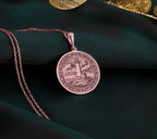 Rose Gold Plated Lighthouse Pendant with maritime scene. Warm-toned coastal medallion with detailed beacon tower and textured seascape. Nautical jewelry celebrating guidance and steadfast protection, perfect for beach and ocean lovers.