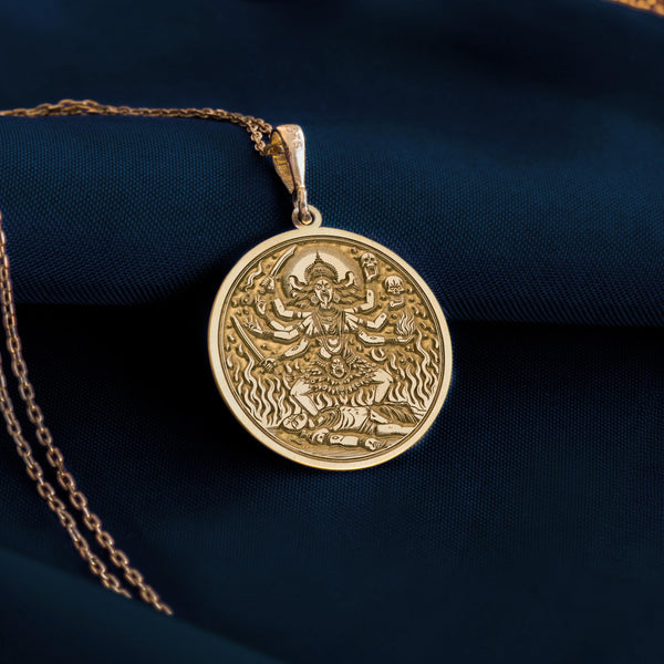 14K solid gold Kali Mata amulet, a powerful talisman for protection, symbolizing strength and divine transformation.