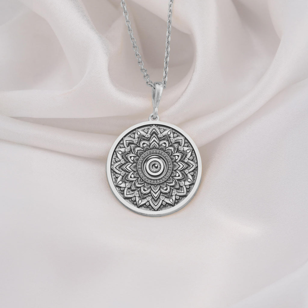 925 Sterling Silver Sacred Mandala Evil Eye Medallion showcasing intricate lotus petals with protective evil eye center and spiritual elements. Detailed protection coin pendant. Premium mandala jewelry symbolizing evil eye protection.