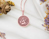 Aquarius necklace in rose gold plating, featuring the Water Bearer symbol. A beautiful zodiac pendant that combines elegance with a modern finish, perfect for astrology enthusiasts seeking a trendy yet meaningful piece of jewelry to wear daily.