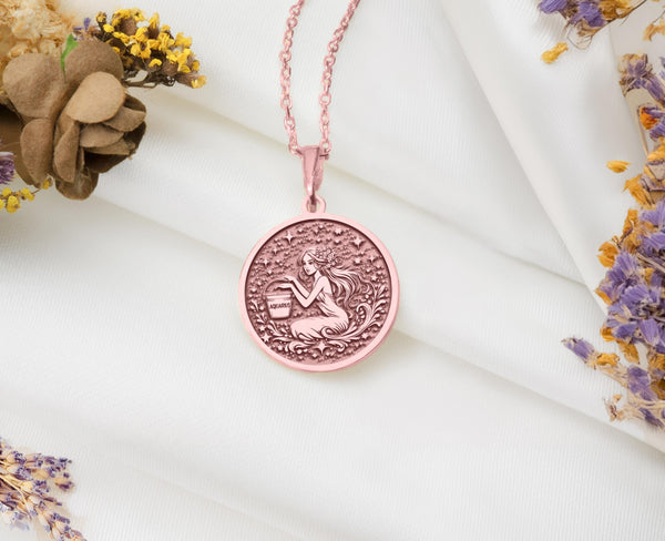 Aquarius necklace in rose gold plating, featuring the Water Bearer symbol. A beautiful zodiac pendant that combines elegance with a modern finish, perfect for astrology enthusiasts seeking a trendy yet meaningful piece of jewelry to wear daily.
