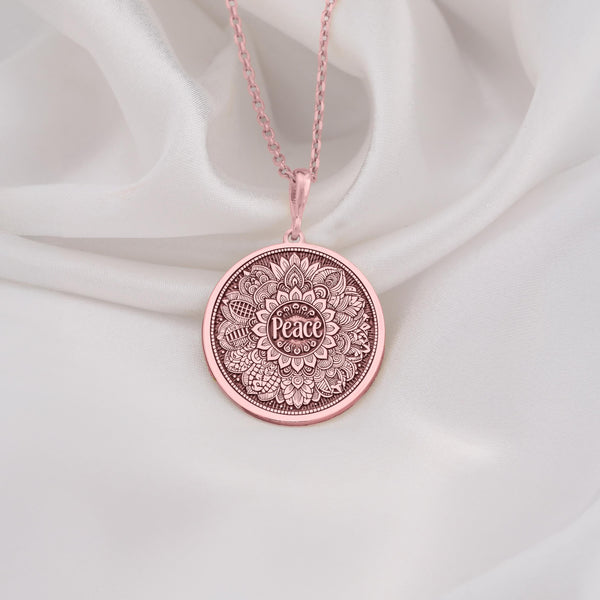 Charming Rose Gold Plated Peace Mandala Necklace with intricate spiritual detailing. A bohemian-inspired pendant ideal for yoga lovers and mindfulness enthusiasts. Makes a thoughtful and elegant gift for any occasion or celebration.