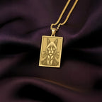 A rectangular 14K gold plated pendant necklace featuring a detailed laser engraving of a dapper Siamese cat in a Victorian suit.